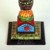 Kandelaar van beschilderd hout